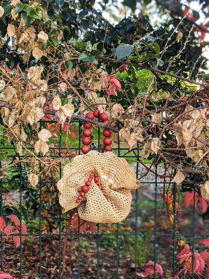 Upcycled straw pouch bag with beads