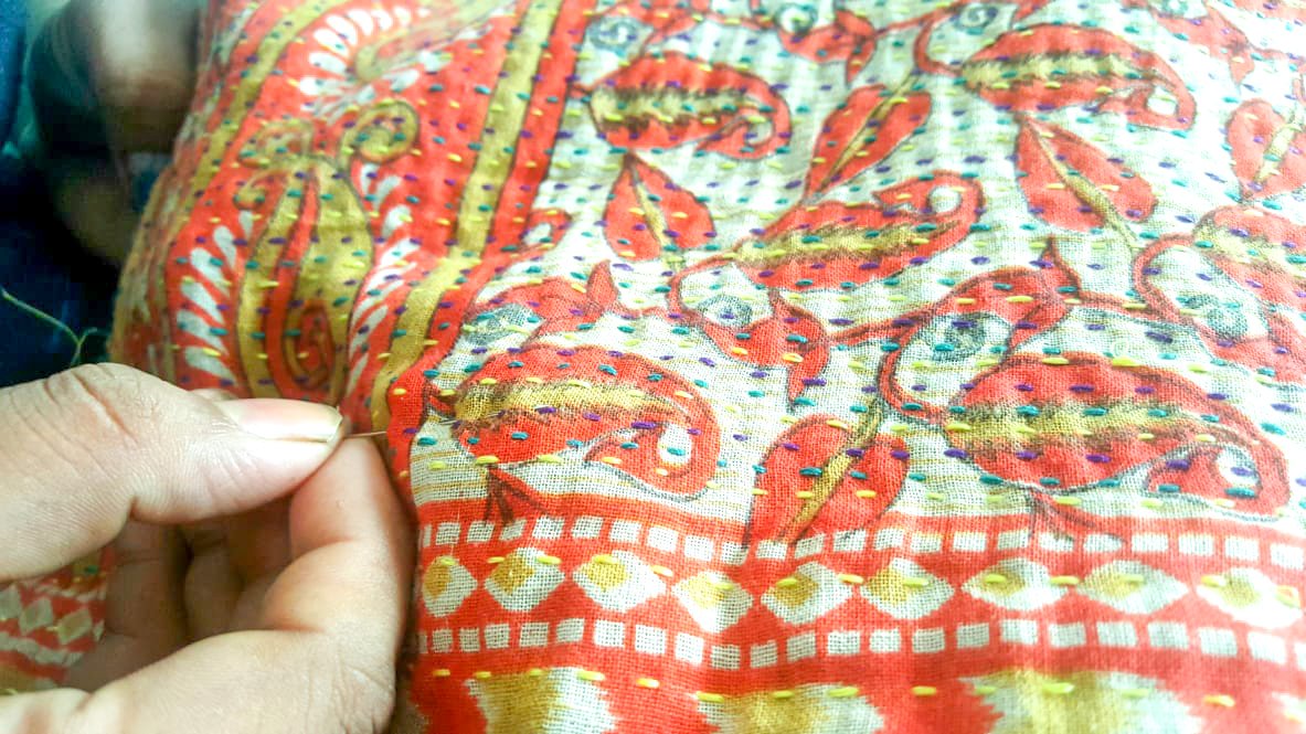 Upcycled sari clutch with kantha stitch