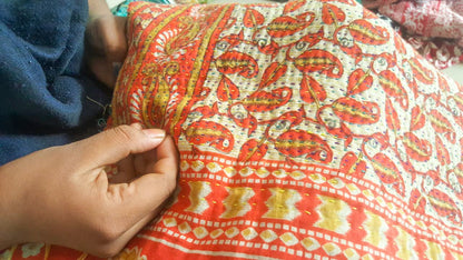 Upcycled sari clutch with kantha stitch