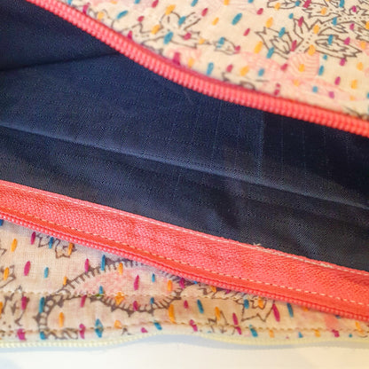 Upcycled sari clutch with kantha stitch