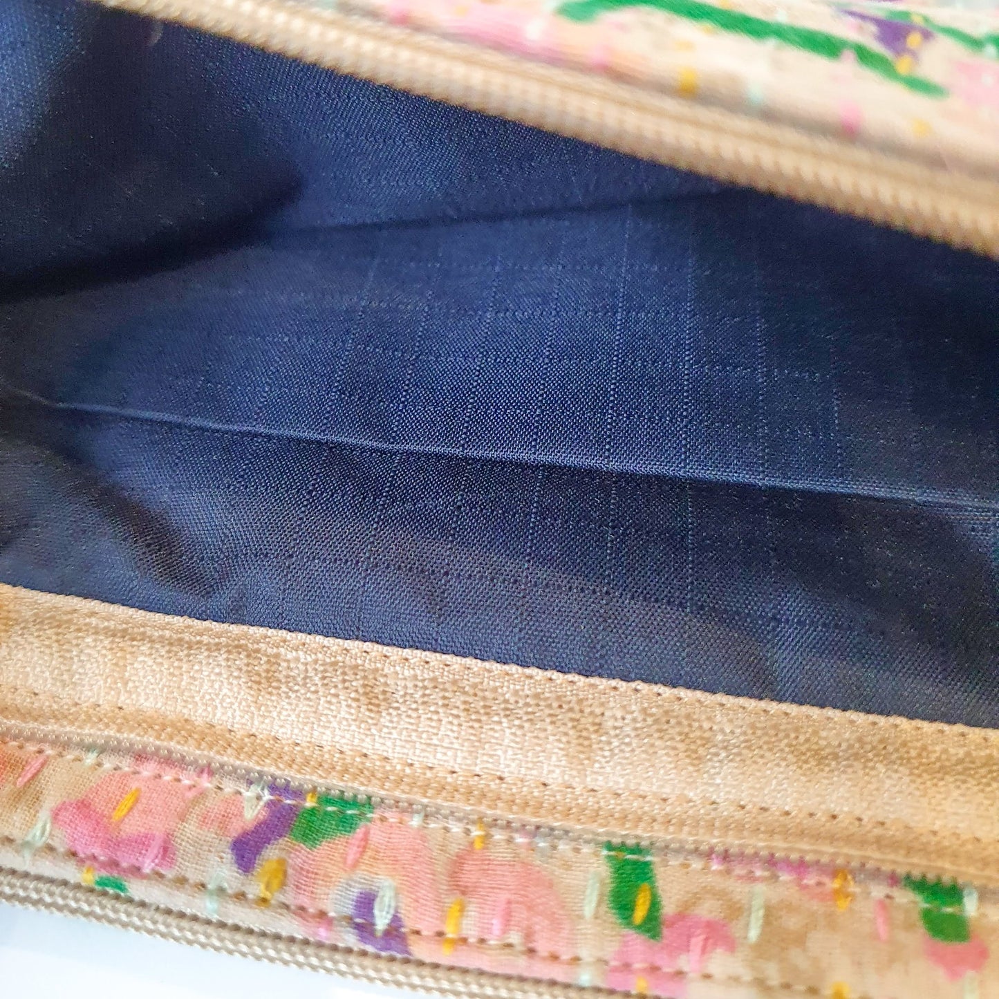 Upcycled sari clutch with kantha stitch