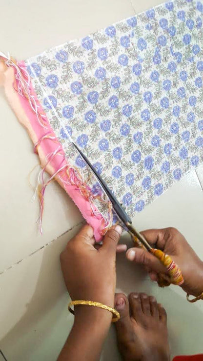 Upcycled sari clutch with kantha stitch