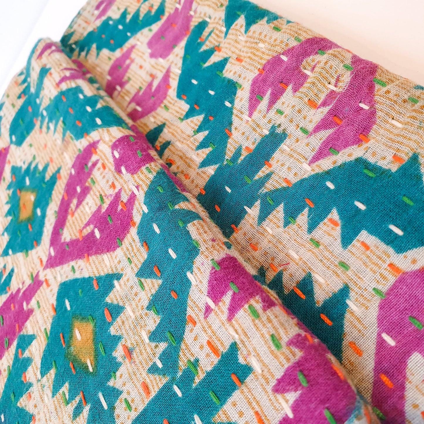 Upcycled sari clutch with kantha stitch