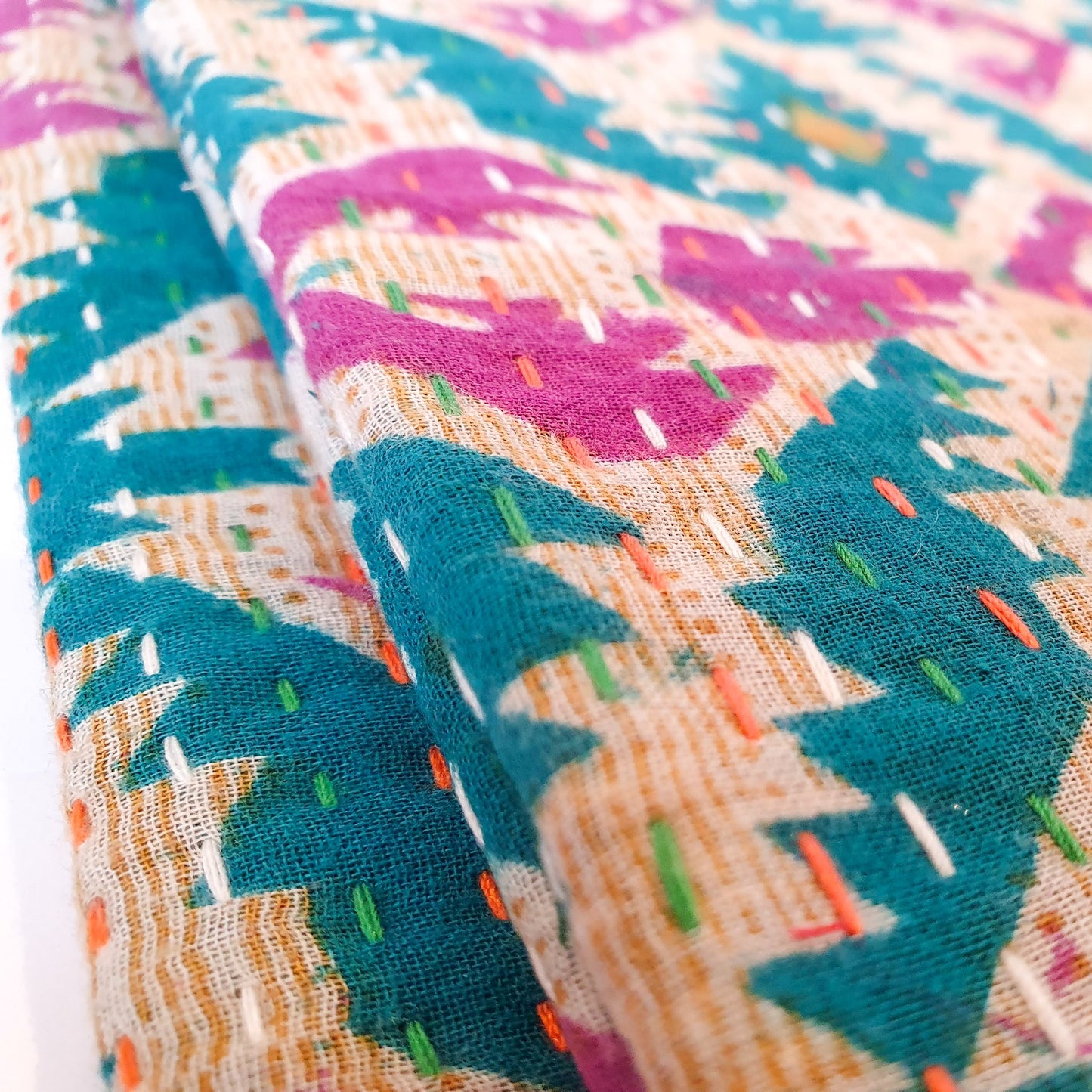 Upcycled sari clutch with kantha stitch