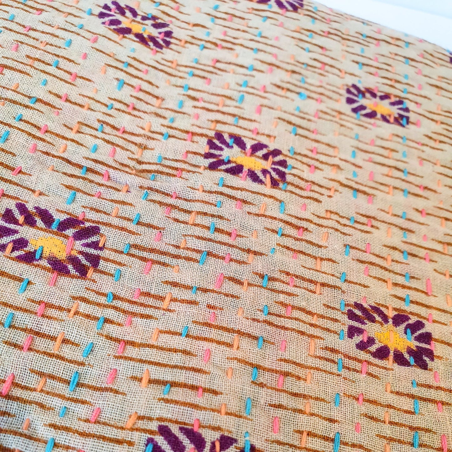 Upcycled sari clutch with kantha stitch