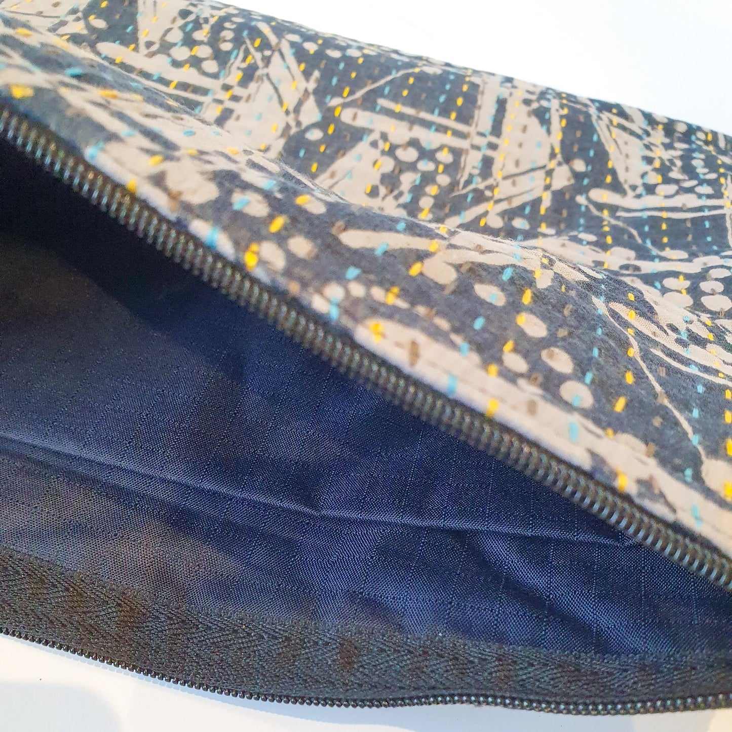 Upcycled sari clutch with kantha stitch