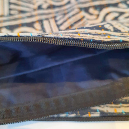 Upcycled sari clutch with kantha stitch