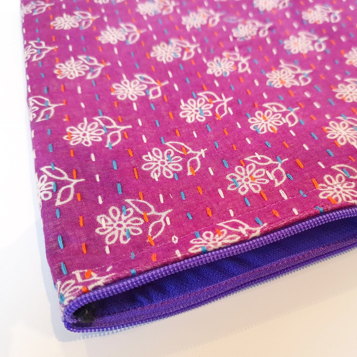 Upcycled sari clutch with kantha stitch